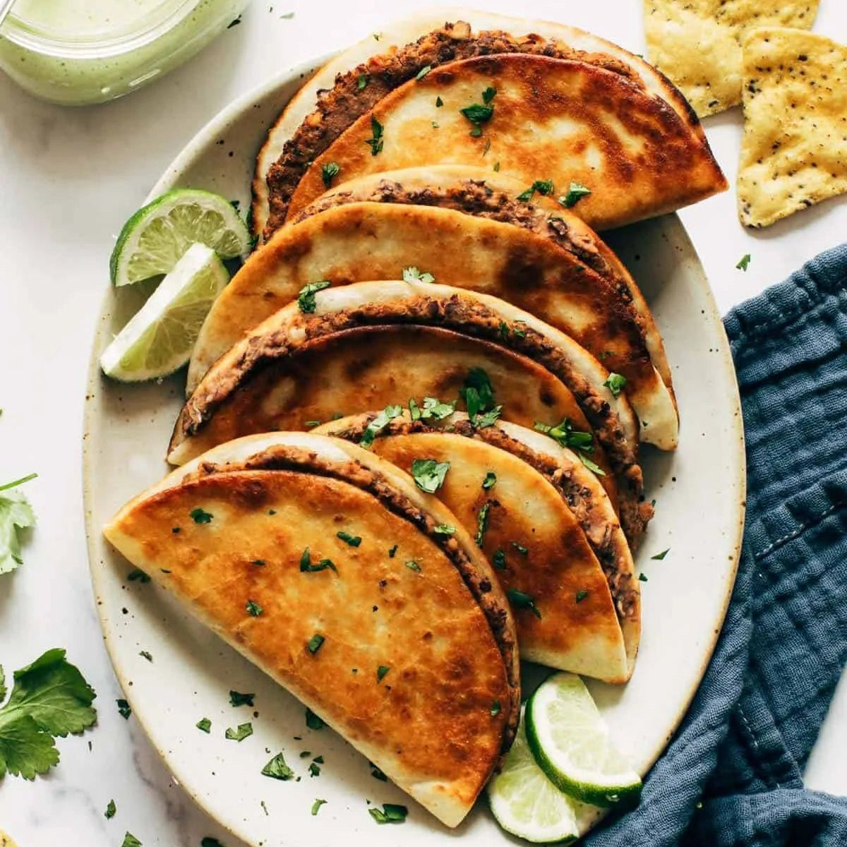 Black Bean & Cheese Crispies with Avocado Crema